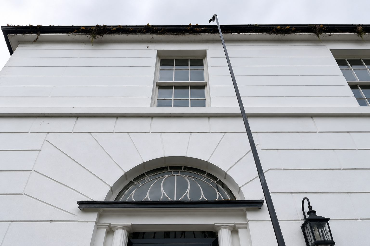 Before gutter cleaning Birmingham — blocked gutter with compacted debris causing overflow and damp risk